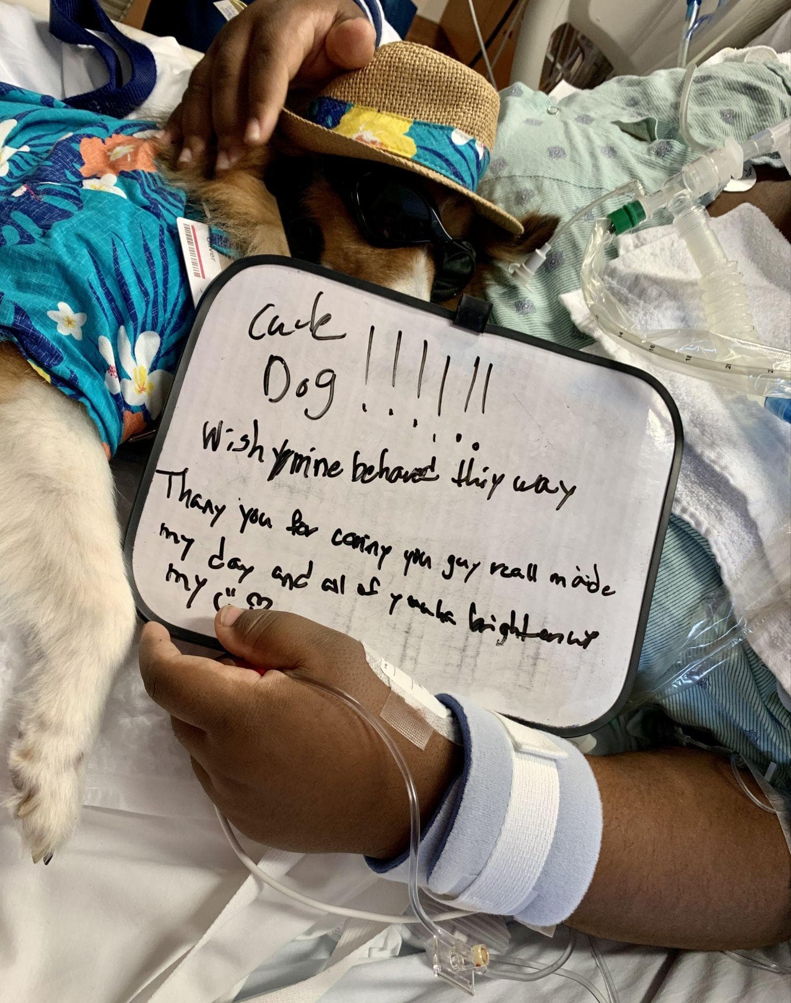 Hospital patient sharing a handwritten note about a canine visit