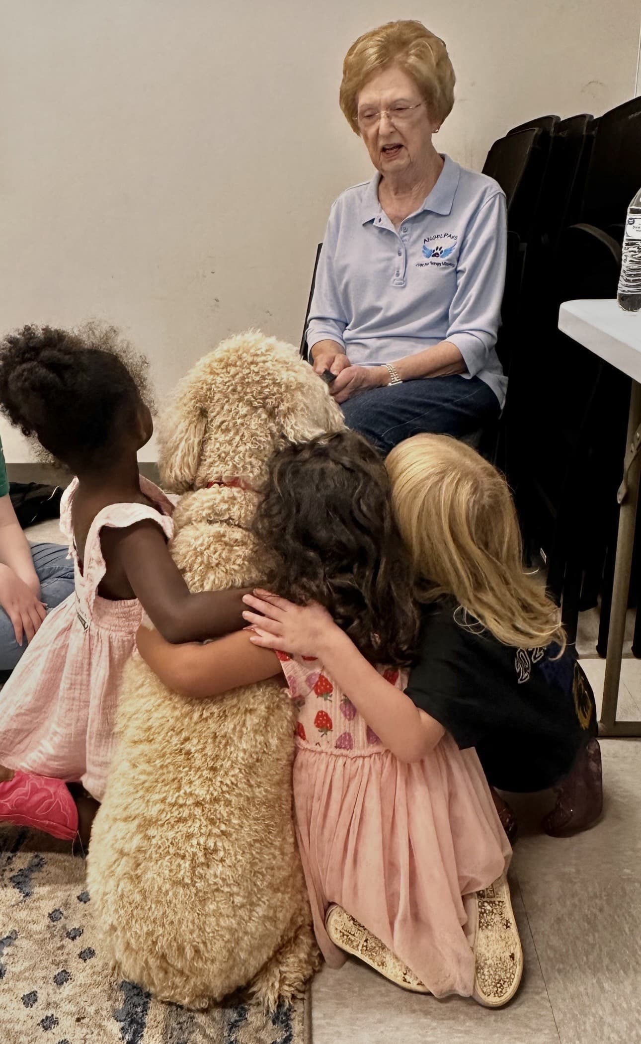 Lillian with foster children and rescue therapy dog Lily at Redeemer Church
